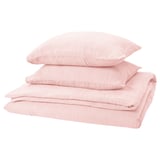 Una pila de ropa de cama de color rosa claro con textura ondulada, con una funda nórdica y dos fundas de almohada. Confeccionado en algodón 100% orgánico.
