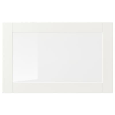 Mueble blanco SINDVIK con frente de cristal transparente, diseño sencillo.