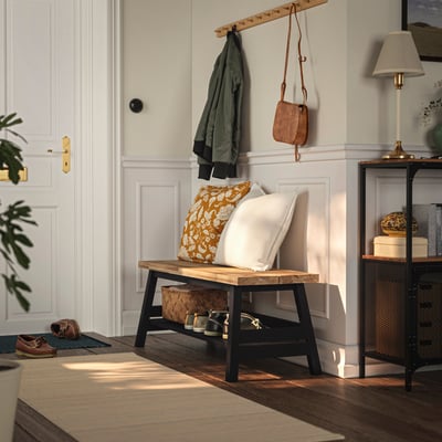 SKOGSTA Banco con almacenaje, acacia/negro, 120 cm