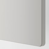 Primer plano de un armario elegante y moderno en blanco puro. Bordes lisos y acabado mate, mostrando un diseño de calidad.