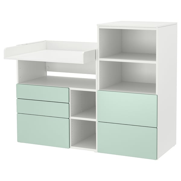Mueble de almacenaje infantil blanco y menta con estantes y cajones, diseño moderno y funcional.