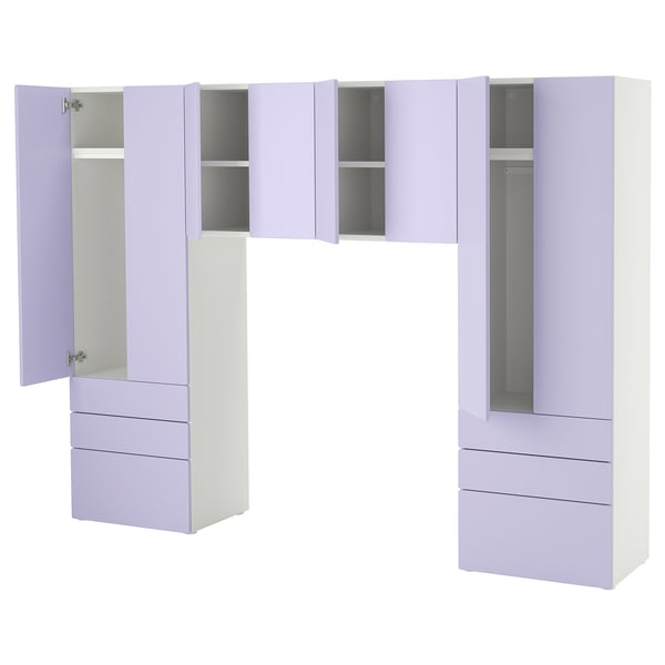 Un gran conjunto de armario SMÅSTAD de color púrpura claro con cajones y armarios, ideal para el almacenamiento y la organización.