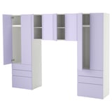Un gran conjunto de armario SMÅSTAD de color púrpura claro con cajones y armarios, ideal para el almacenamiento y la organización.