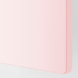 Primer plano del borde liso de la unidad de almacenamiento de color rosa claro, que muestra un diseño limpio y redondeado.