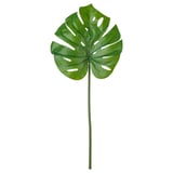 Hoja única, grande, verde, artificial con vetas blancas, unida a un tallo de plástico, con forma genética, fondo blanco.