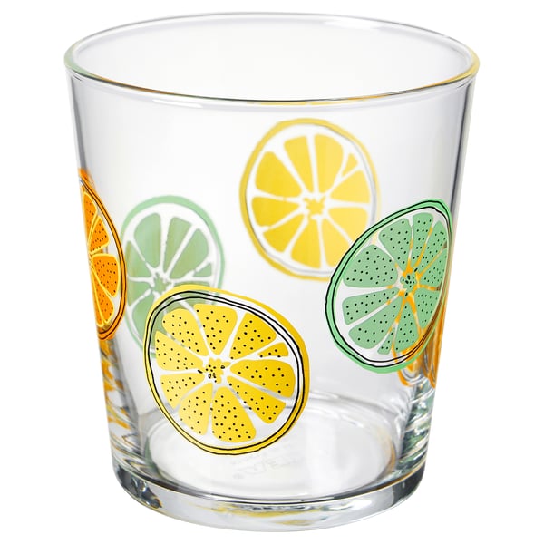 Vaso SPETSEKORRE con coloridas rodajas de cítricos, borde dorado.