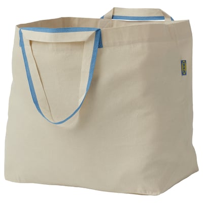 Bolso de algodón crema con ribete azul, asas grandes, logo pequeño. Duradero y lavable.