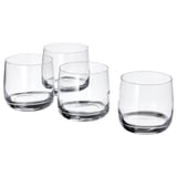 Cuatro vasos STORSINT transparentes y cilíndricos dispuestos en forma de diamante, que muestran su diseño suave y sin costuras y su brillo cristalino.