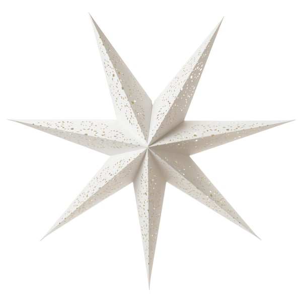 La lámpara blanca en forma de estrella STRÅLA, hecha de cartón, emite una luz cálida.