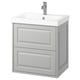 Tocador de baño gris moderno con mueble gris claro, 2 cajones, lavabo de cerámica blanca, grifo cromado.