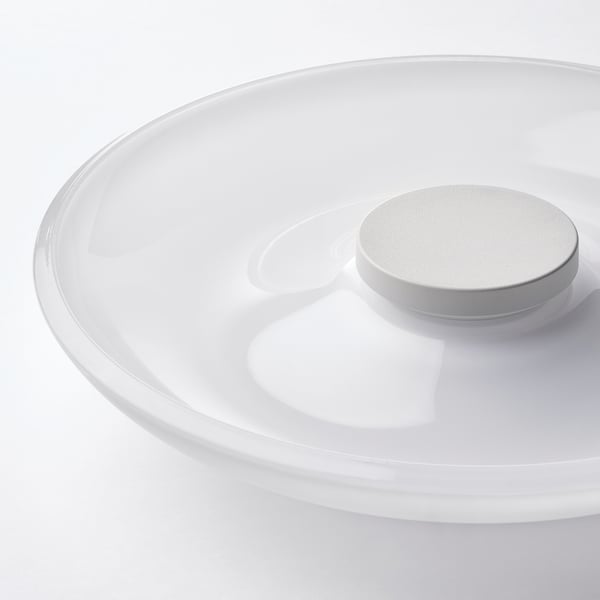 Cargador elegante y moderno, diseño blanco. Tapa redonda, acabado liso.