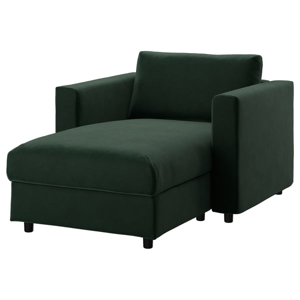 Verde oscuro, sillón moderno con cojines, forma cuadrada, patas de madera oscura.