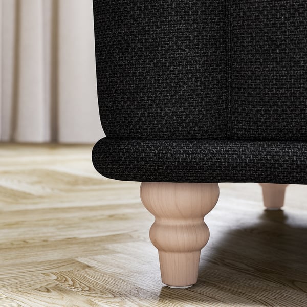 Pata de sofá VISKAFORS negra, de madera, diseño redondeado.