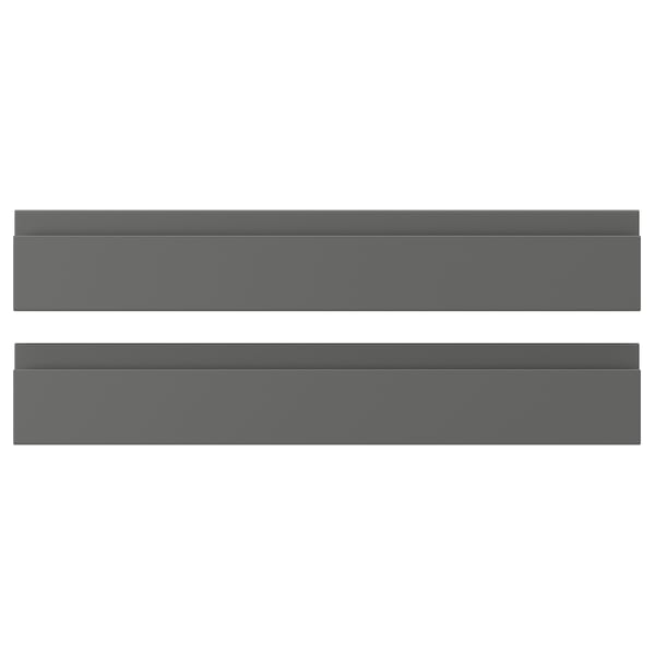 Dos paneles planos rectangulares de color gris oscuro, probablemente frentes de armarios de cocina, con un diseño moderno y suave, colocados uno al lado del otro.