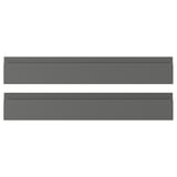 Dos paneles planos rectangulares de color gris oscuro, probablemente frentes de armarios de cocina, con un diseño moderno y suave, colocados uno al lado del otro.