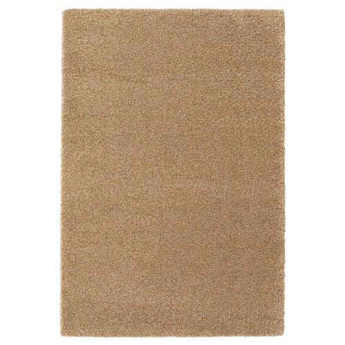 BREVBÄRARE alfonbra beige bat, ehundura uniformea, forma laukizuzena eta diseinu sendoa, polipropilenoa eta kautxu sintetikoa duena.