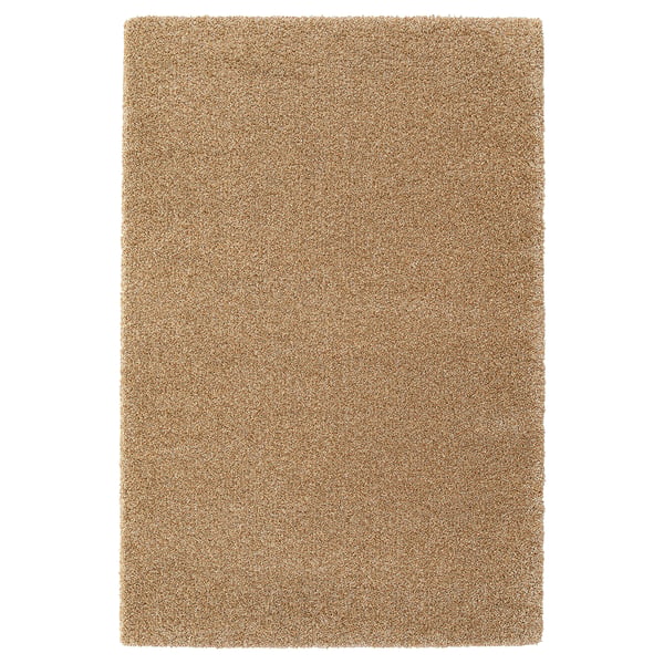 BREVBÄRARE izeneko alfonbra laukizuzen beige bat, polipropilenoz eta kautxu sintetikoz egina.