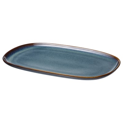 GLADELIG platera, urre-koloreko ertzak dituen ozeano urdina, forma obalatua, artisau-diseinu bakarra, gresez egina.