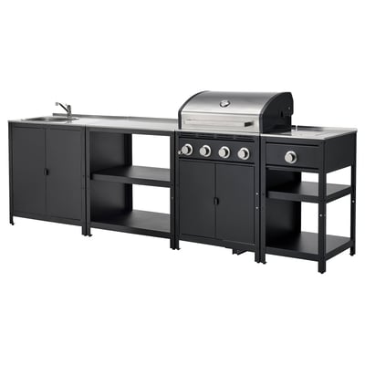Kanpoko sukaldaritza seta: GRILLSKÄR, kolore beltzekoa altzairu herdoilgaitzarekin. Gas parrilla, harraska, apalak eta kabineteak. Aire zabalean prestatzeko egokia.