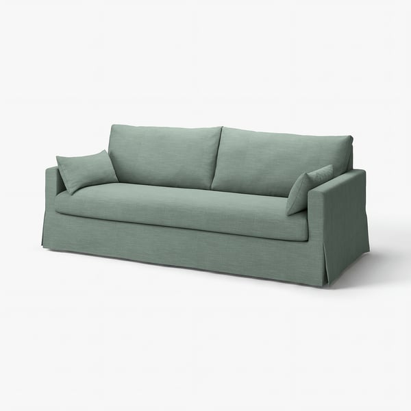 HYLTARP berdeko sofa bat, kotoi iraunkorrez eta poliester birziklatutako ehunez egina, testuradun eta tonu-tonu diseinuarekin.