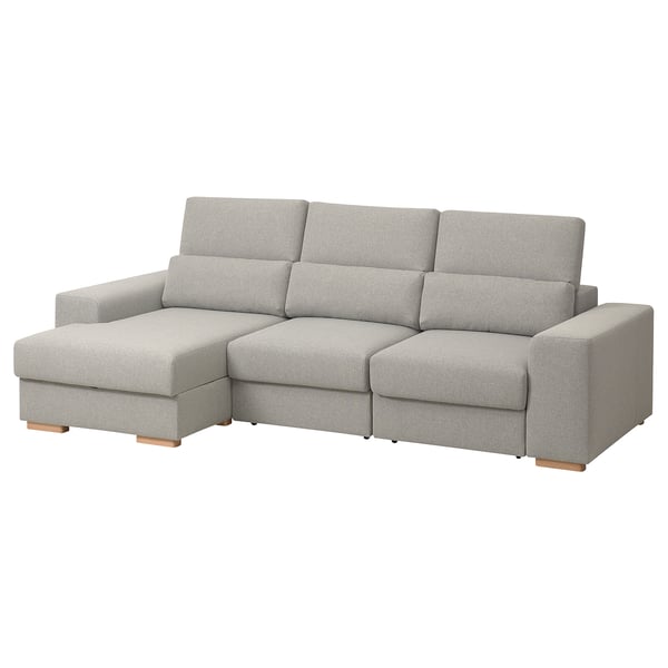 L formako sofa gris modernoa, egurrezko hanka argiak, bizkarralde altua, bizkarralde doigarriak.