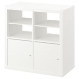 KALLAX apalategi zuria, biltegi ireki eta itxia duen kubo formakoa, diseinu modernoa eta minimalista.