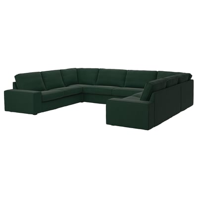 KIVIK U berde ilunaren formako sofa sekzionala, eserleku sakonak, ehun leuna eta egitura aldakorrerako erauzgarriak diren besaulki-euskarriak dituena.