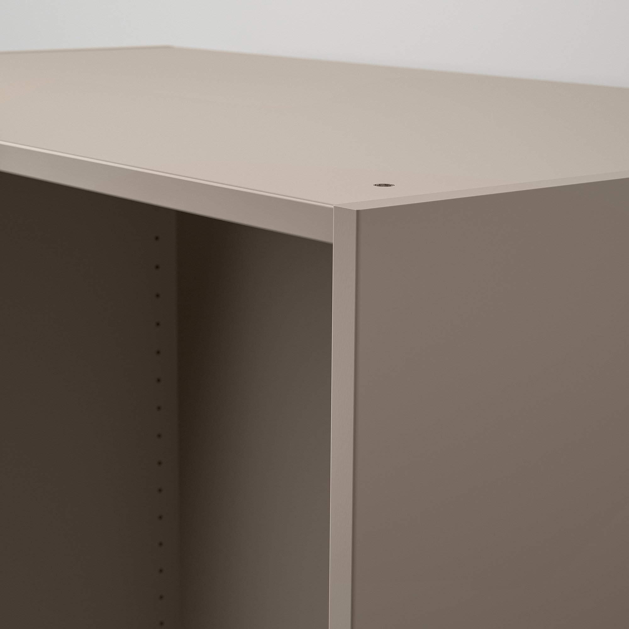 Armairu moderno, gris argi, akabera dotore, diseinu minimalistaren goiko izkinaren xehetasuna.