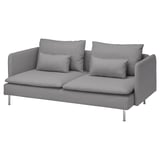 Sofa modernoa, diseinu baxu eta leunekoa, kuxin solteak, hanka altuak, tonerud bihurtua.