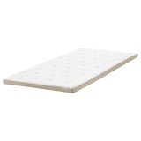 Beige argiko TISTEDAL estalki bat, lihoa eta latexa bezalako material naturalekin egina, erosotasuna eta transpirabilitatea eskaintzeko diseinatua.