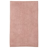 TOFTBO bainu-alfonbra bat, beige kolorekoa. Angeluzuzena da, angelatua eta poliesterra birziklatua.