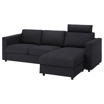 Sofa modular VIMLE gris iluna da, kuxin desenfundagarriekin, baita txaise longue bat ere, erosotasuna eta estiloa eskaintzen duena.