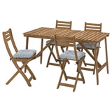 Conxunto de comedor exterior de madeira con 4 cadeiras plegables e coxíns. Acabado natural.