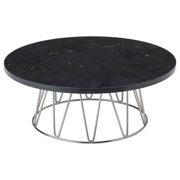 Soporte de torta de mármore negro redondo. Catro patas metálicas cromadas con soportes en forma de V. Deseño moderno e elegante.