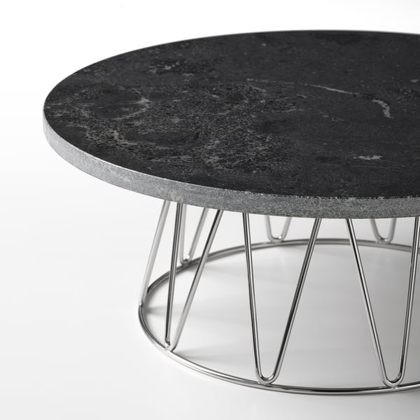 Soporte de torta arquitectónica con tapa de mármore, patas metálicas, base xiratoria, deseño elegante.