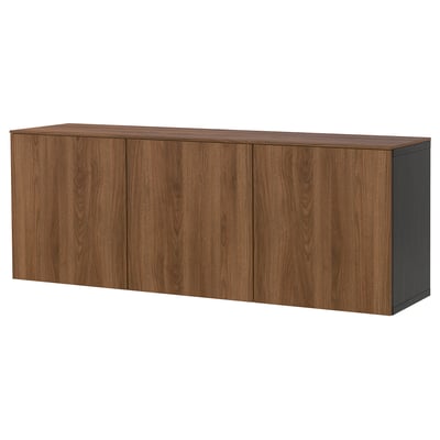 Un sideboard ikea BESTÅ en cor madeira natural con forma rectangular e catro portas de armario de madeira, proporcionando amplo espazo de almacenamento.