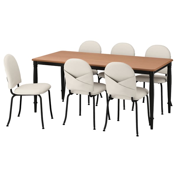 DANDERYD: conxunto de 6 pezas con mesa de madeira e cadeiras beige, elegantes pernas de metal negro, deseño minimalista para espazos modernos.