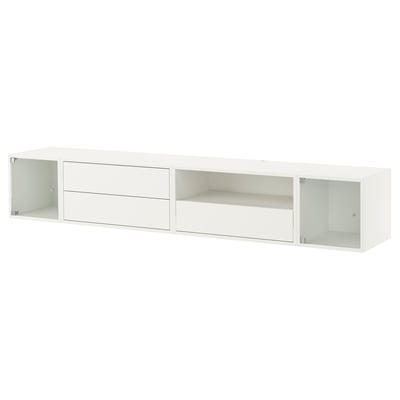 Unidade de almacenamento branco con portas e caixóns de vidro.