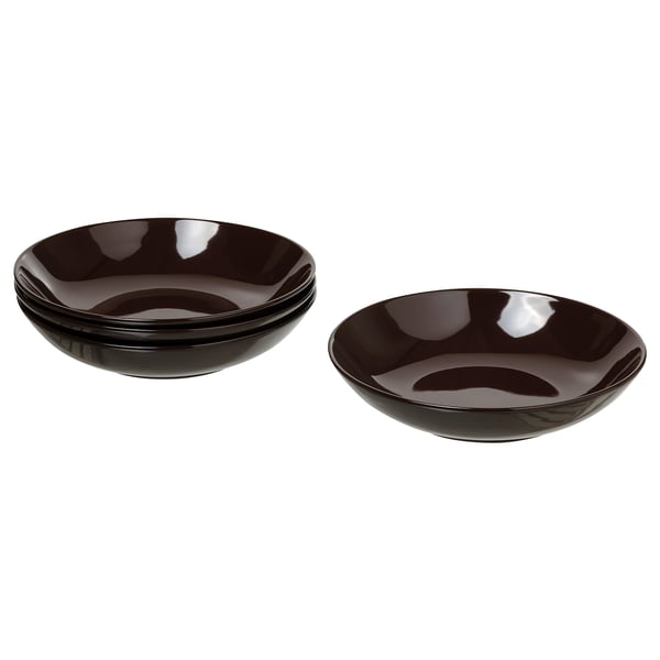 Imaxe de tres cuncas de gres FÄRGKLAR negro apiladas, elegantes e elegantes para servir varias comidas.