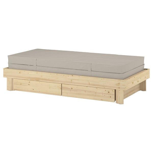 Cama extensible GLAMBERGET en beige con base de madeira e coxíns.