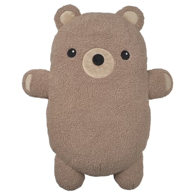 Adorable almofada de oso marrón, feita de poliéster reciclado, forma cilíndrica con detalles cara amigables.