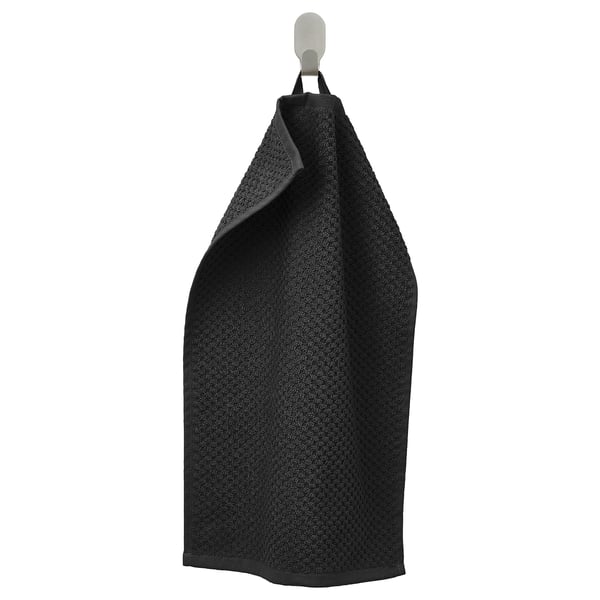 Toalla negra GULVIAL, dobrada en gancho, algodón suave, de forma rectangular.