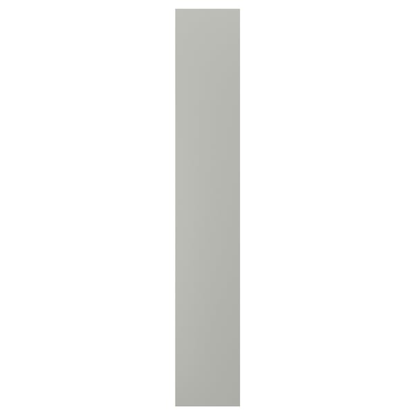 Un panel rectangular gris claro chamado HAVSTORP. É lisa con liñas limpas e feita de taboleiro de fibra pintado acrílico.