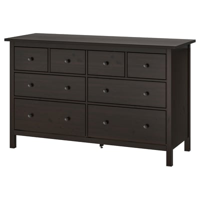 Un armario de madeira gris escuro HEMNES con seis caixóns en dúas filas. O deseño é sinxelo e moderno con pomos redondos.