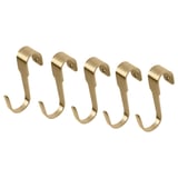 Cinco ganchos metálicos dourados, cada un cun arco superior e unha base plana, colocados xunto a outro en acabado de latón.