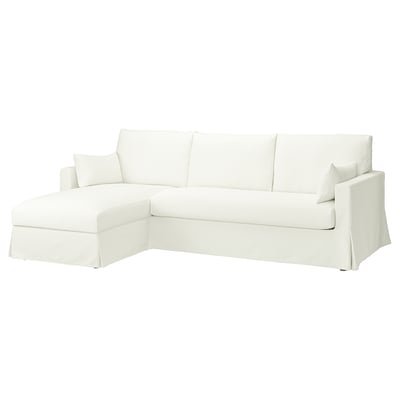 Permutación dun sofá branco en forma de L chamado HYLTARP nun deseño minimalista con liñas limpas e confort acolchado.