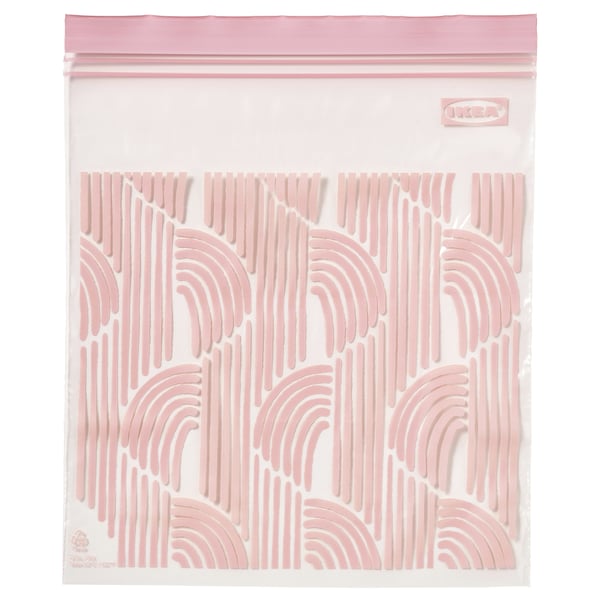Unha bolsa de almacenamento ISTAD reutilizable rosa cun patrof ondulado, feita de plástico sostible.