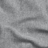 Cuberta de sofá gris con patrán sutil de arenque, textura suave e brillo lixeiro.