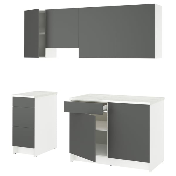 Armarios de cociña gris e brancos modernos con mesa. Unidades de parede e base; Portas e caixóns.