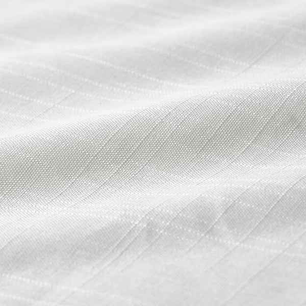 Primeiro plano de tecido suave, 100% algodón. Textura nítida, liñas bordadas horizontais. Ecolóxico e duradeiro.